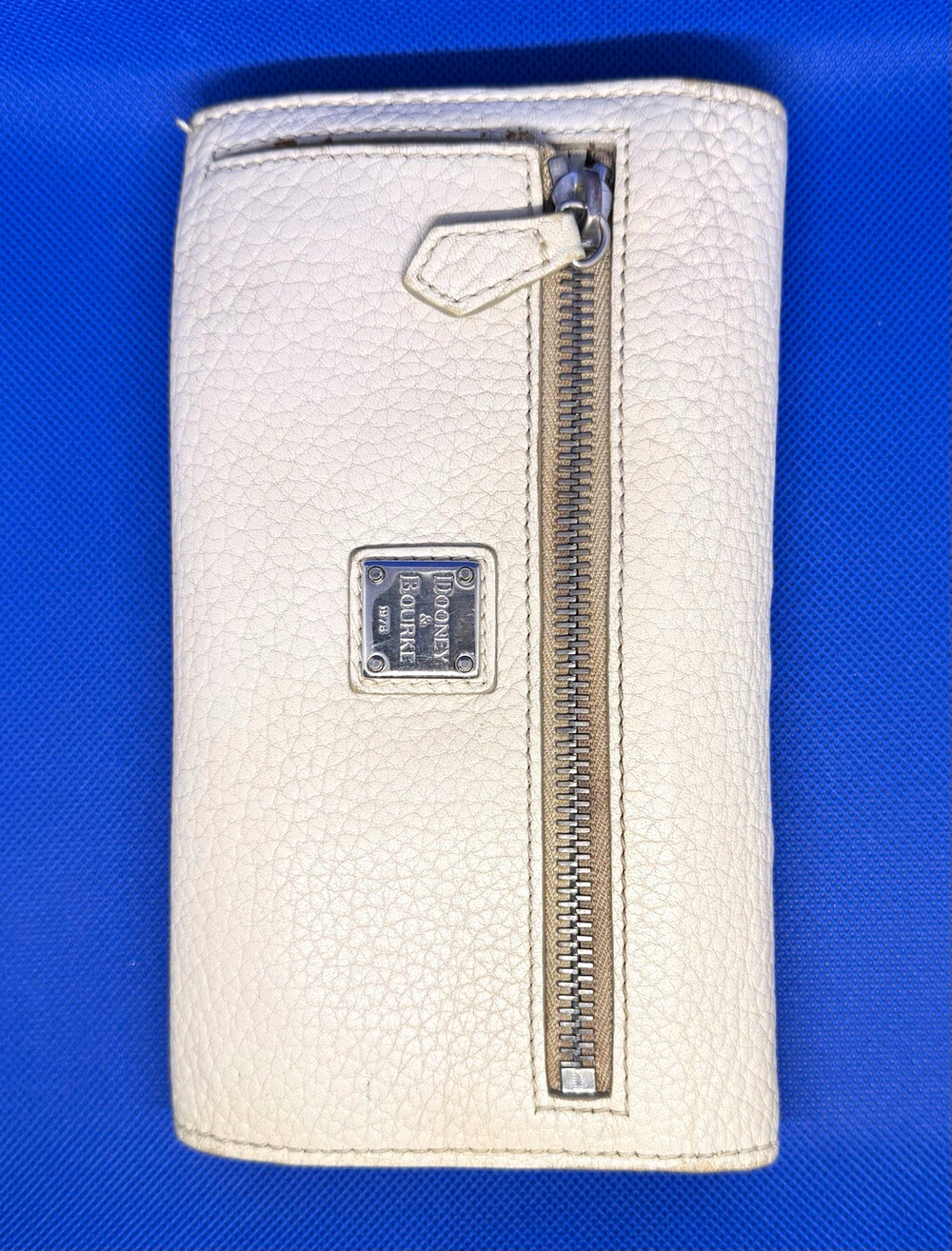 Dooney & Bourke Bone Pebbled Leather Trifold Checkbook Organizer Wallet